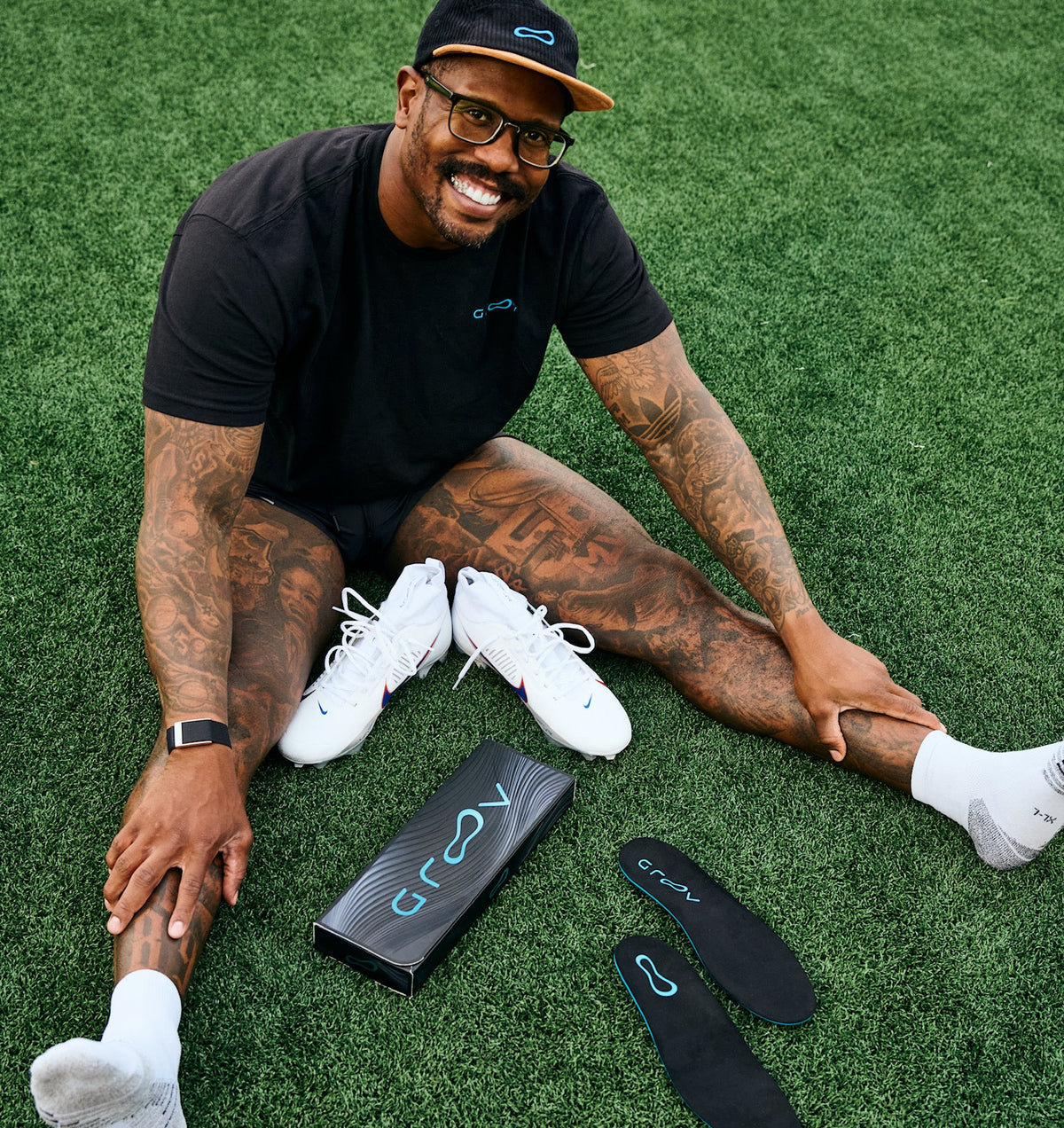 Professional athlete Von Miller with his Groovs on football field.