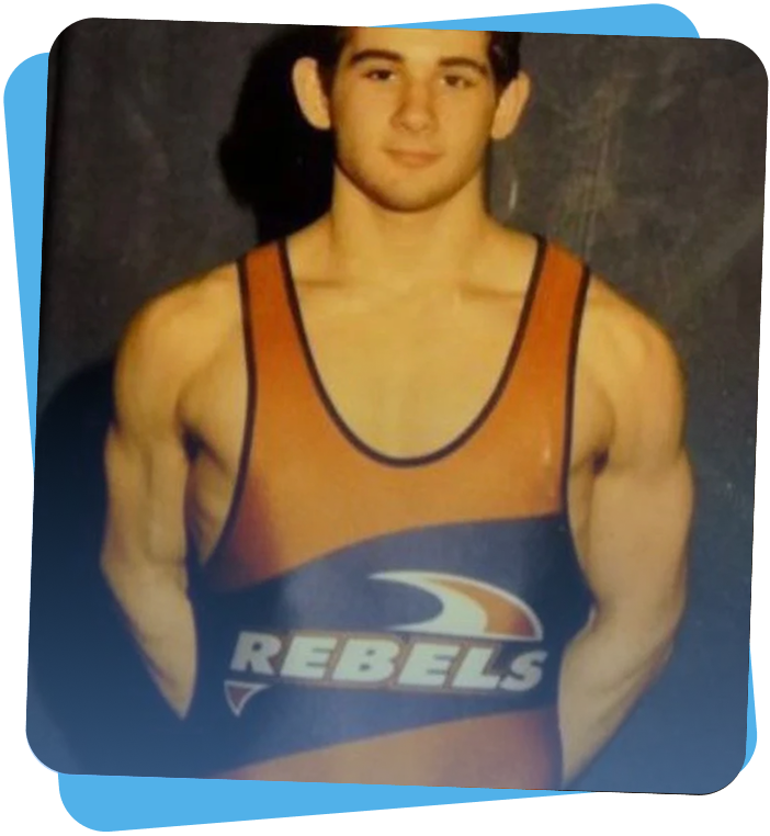 Dan wearing his college athletic uniform.