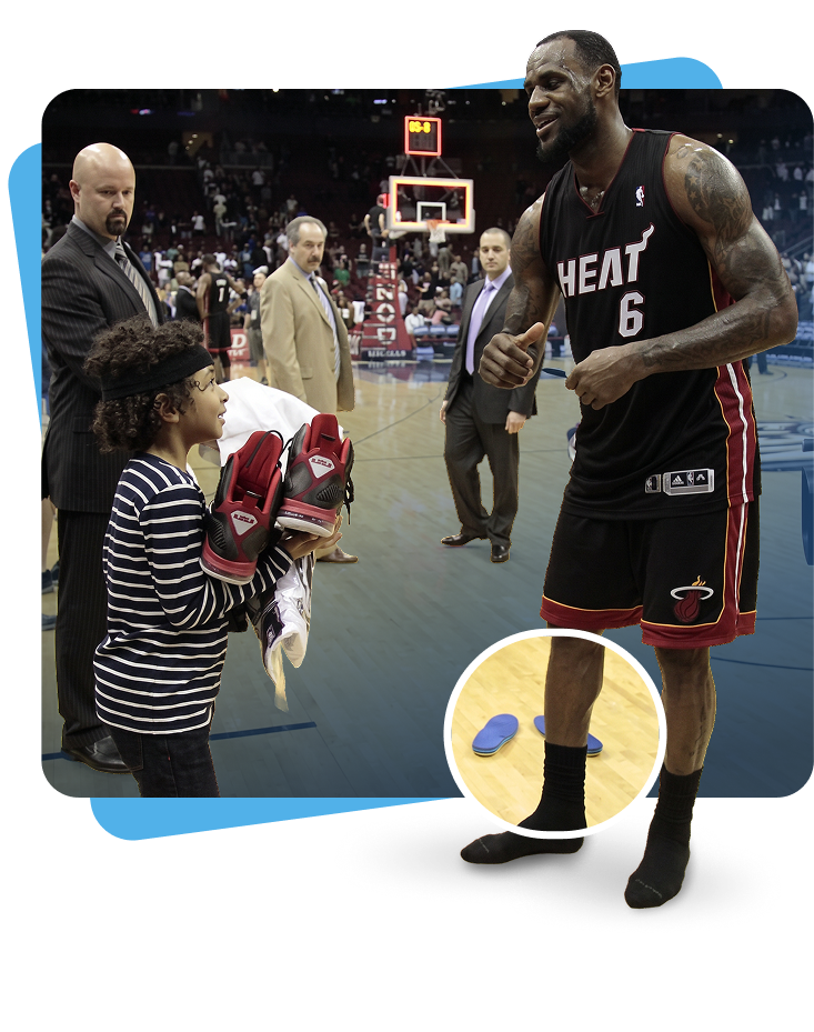 LeBron James giving his shoes to a fan while keeping his custom insoles.