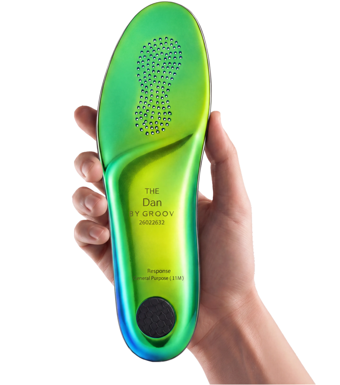 A hand holding The Response custom insole.